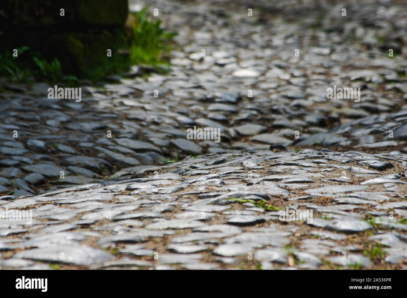 close up of ancient historic cobble stone paved street near Dolny Mlyn in Bohemian Switzerland national park Stock Photo
