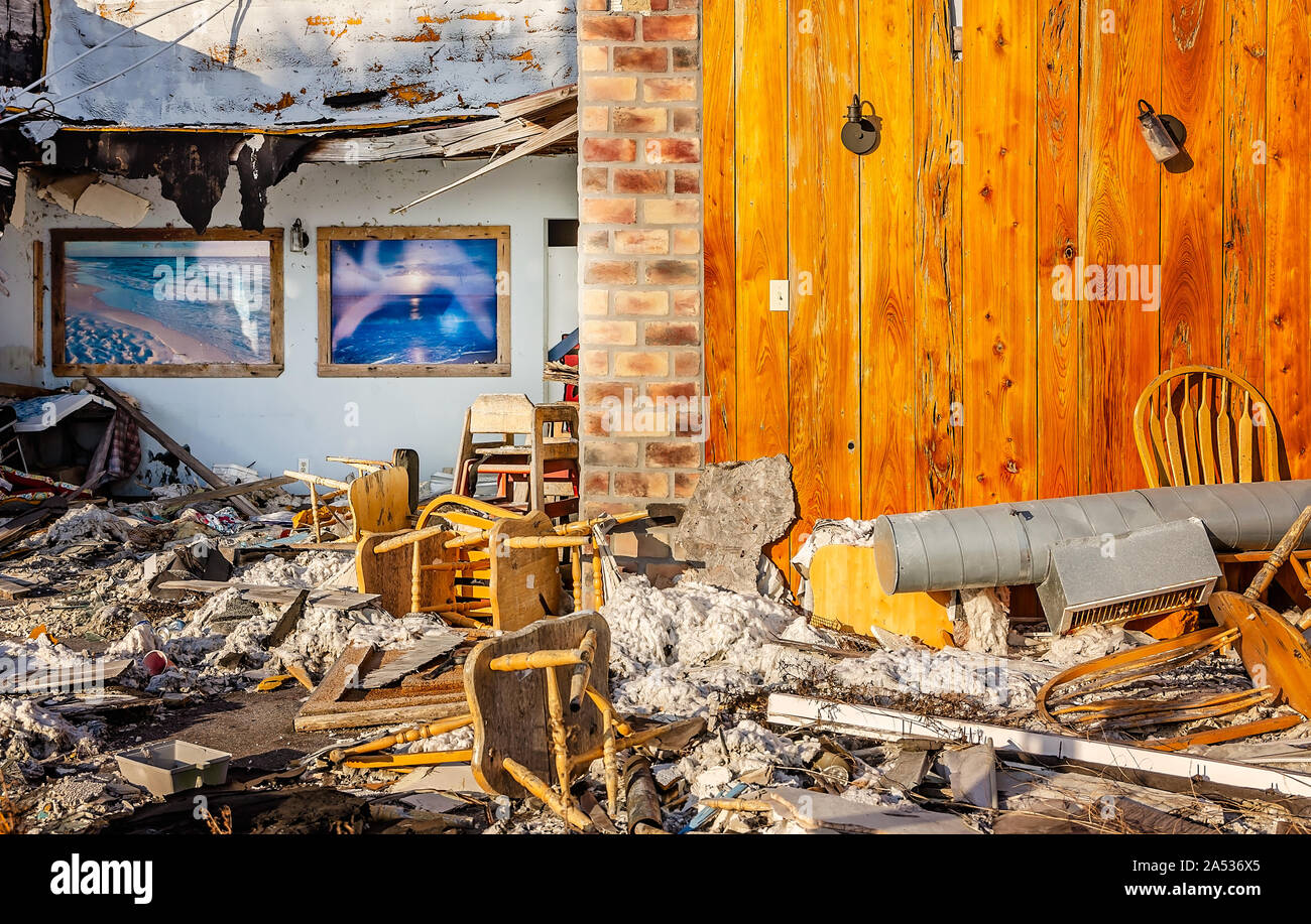 Tables chairs and debris litter the dining room of The Fish House restaurant which was destroyed by Hurricane Michael in Mexico Beach Florida Stock Photo Alamy