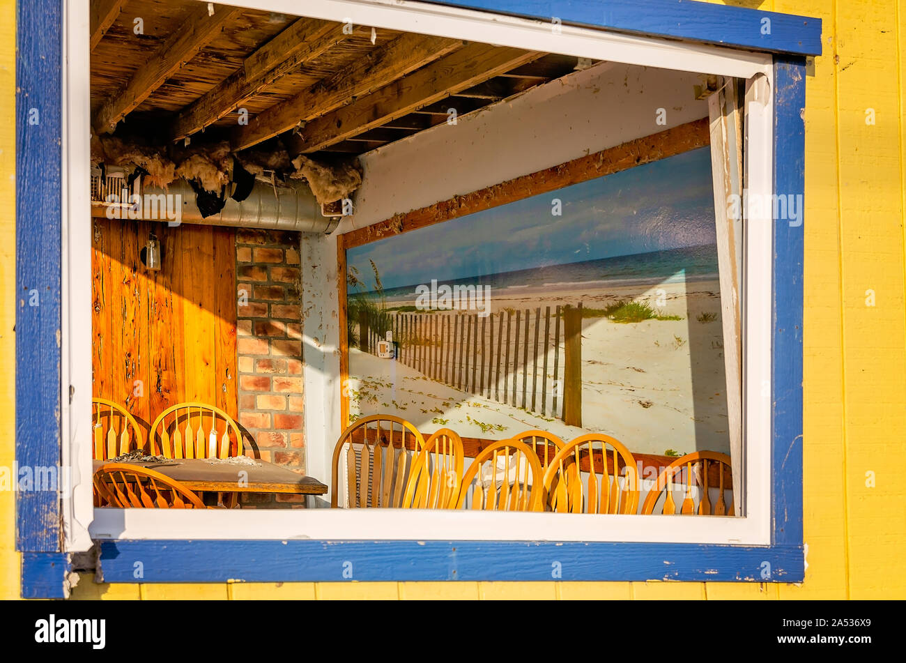 A Photograph Of Mexico Beach Hangs Inside The Fish House Restaurant