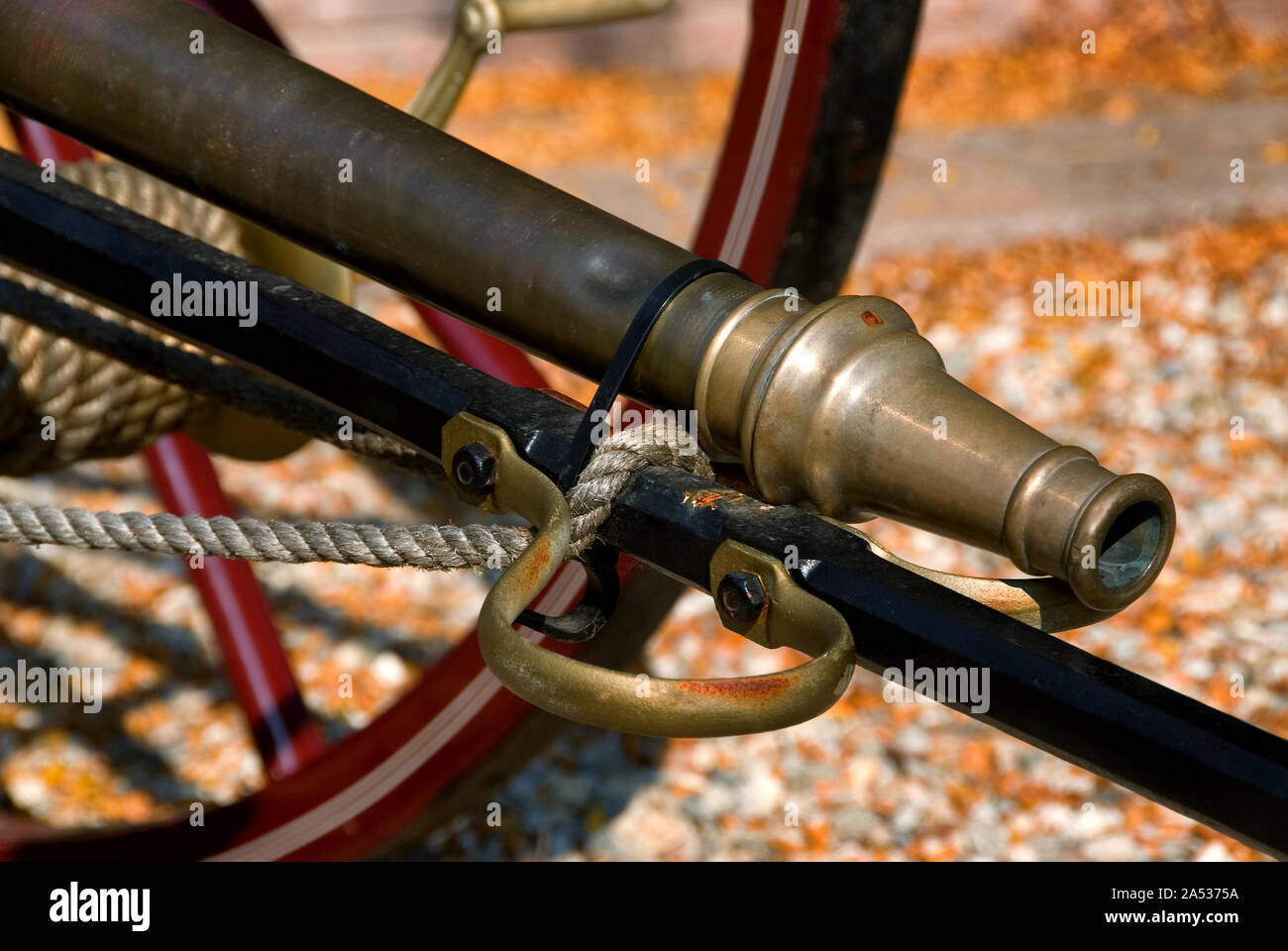 Antique Brass Fire Hose Equipment and Nozzle Stock Photo