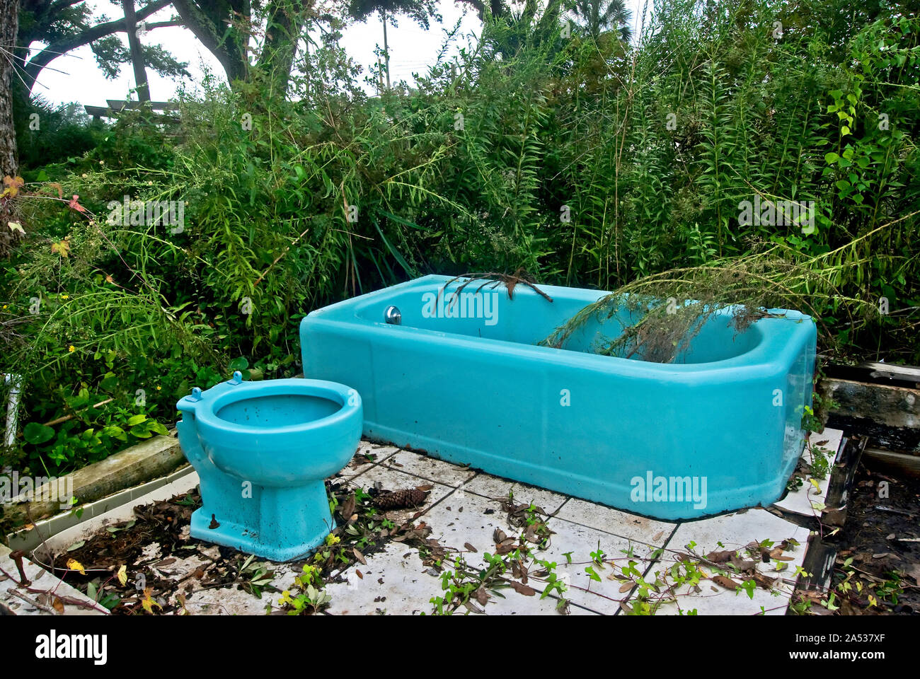 A 1970’s-style turquoise bathtub and toilet are all that remain of a home on Highway 90 in Pass Christian, Mississippi, after Hurricane Katrina. Stock Photo