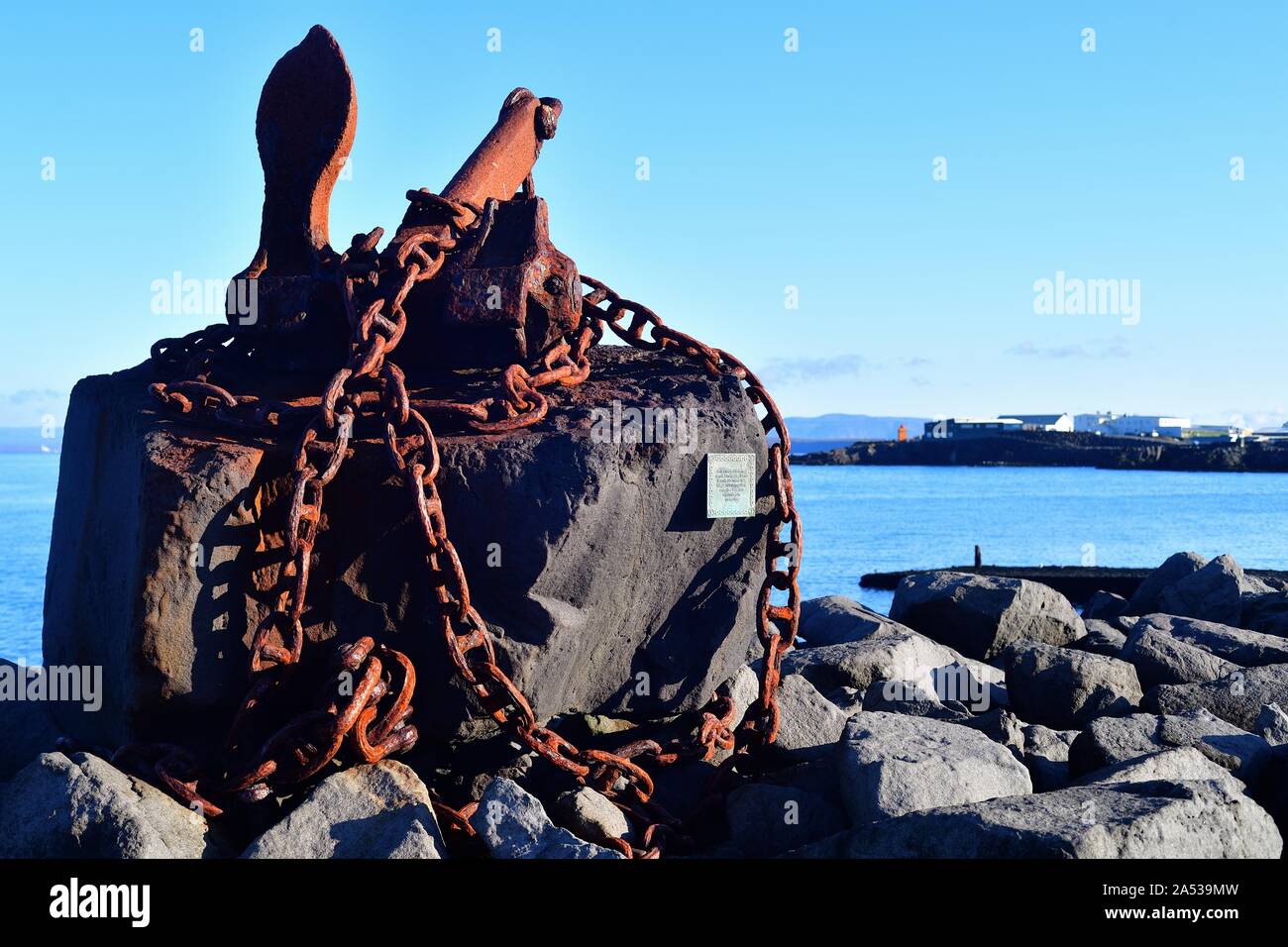 Reykjanesbaer, Iceland. The Anchor Monument, a memorial to sailors that have lost their lives to the sea in Reykjanesbaer along a Keflavik sea wall. Stock Photo