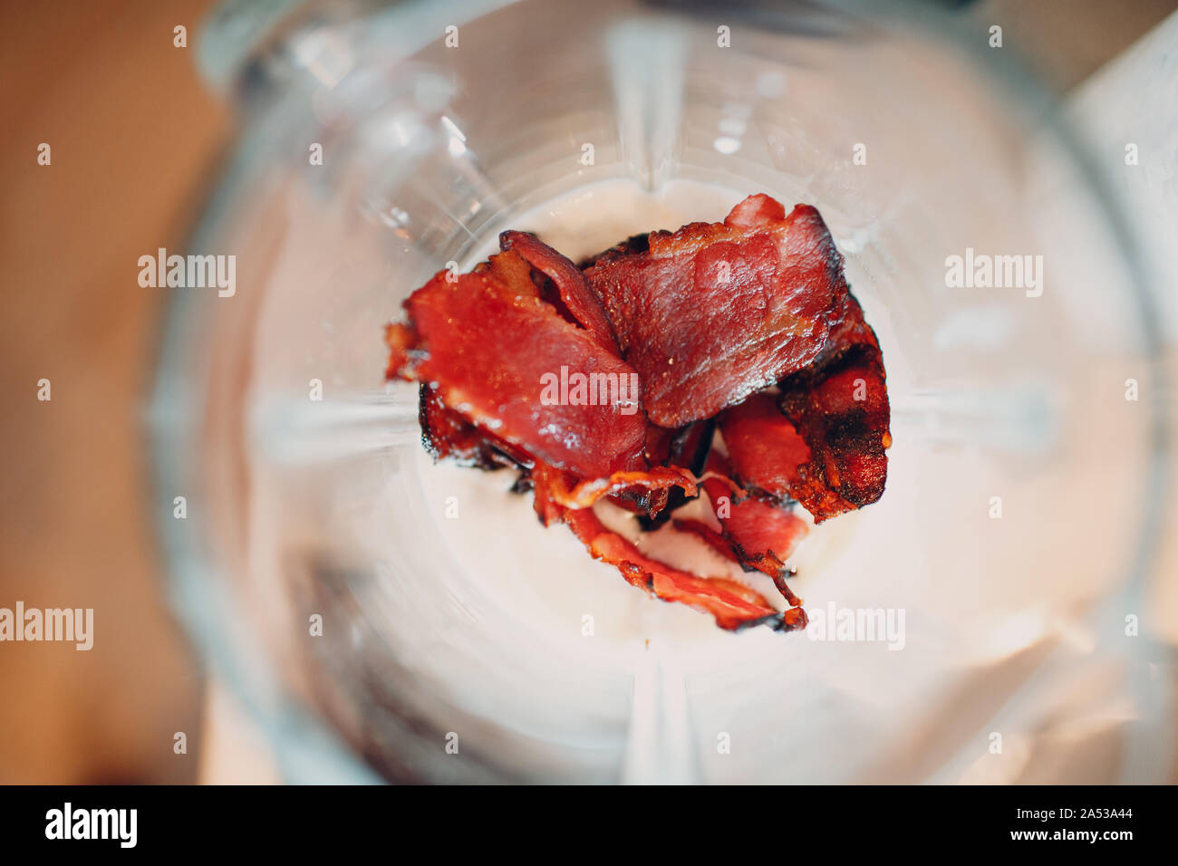 Toasted bacon in a cream mixer blender Stock Photo Alamy