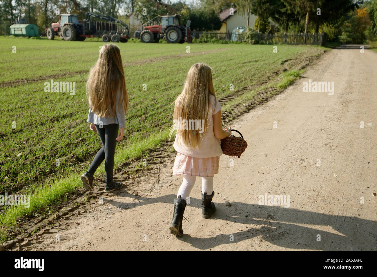 Two girls walking in country hi-res stock photography and images - Alamy