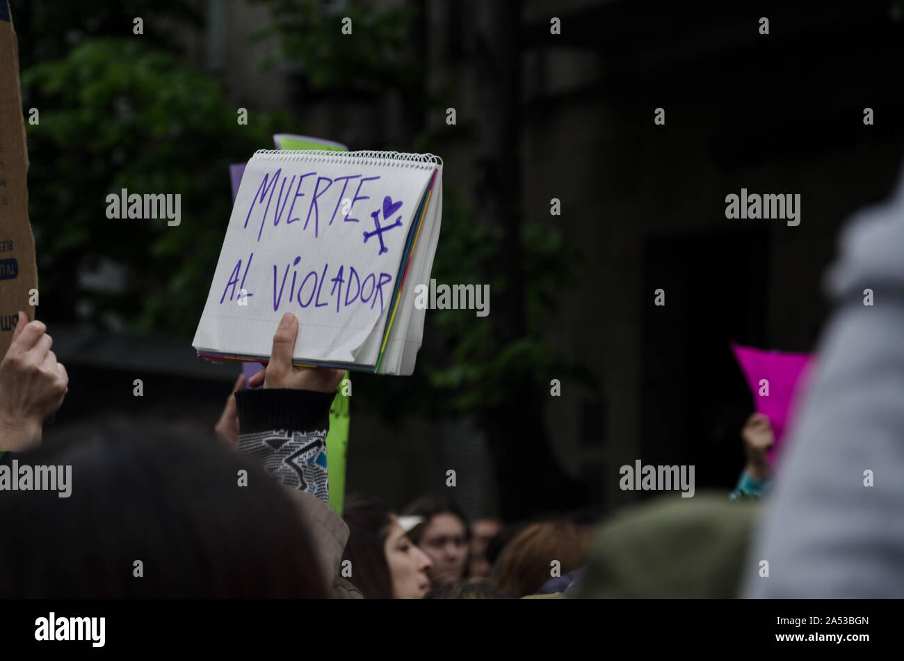 Mar del Plata, Buenos Aires, Argentina. 15-10-2016 Woman's hand in the middle of a demonstration for women's rights, in the street, with a sign with t Stock Photo
