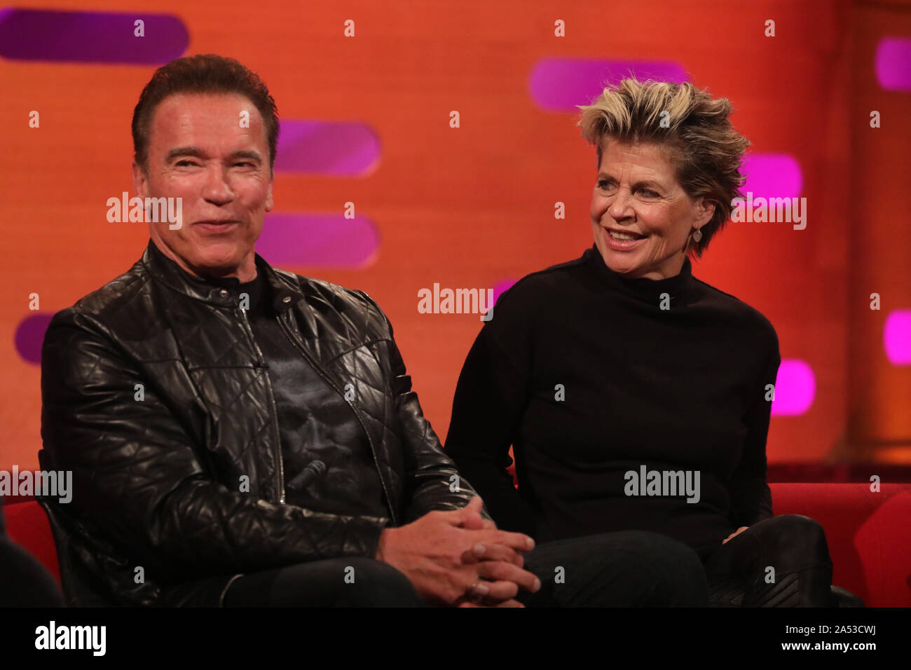 Arnold Schwarzenegger and Linda Hamilton during the filming for the Graham Norton Show at BBC Studioworks 6 Television Centre, Wood Lane, London, to be aired on BBC One on Friday evening. Stock Photo