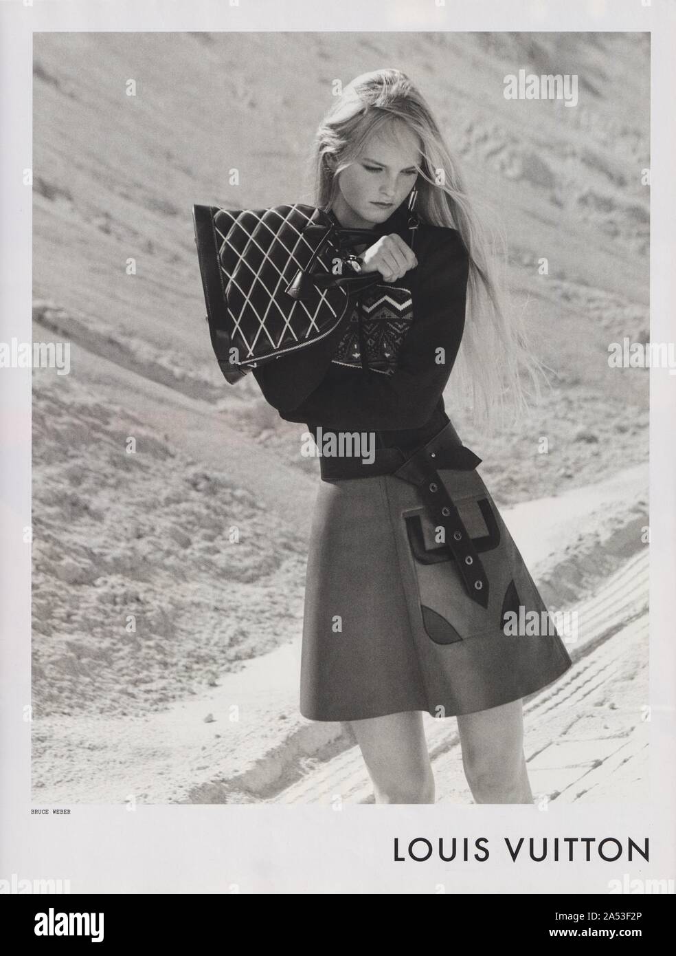 poster advertising Louis Vuitton with Jean Campbell in paper