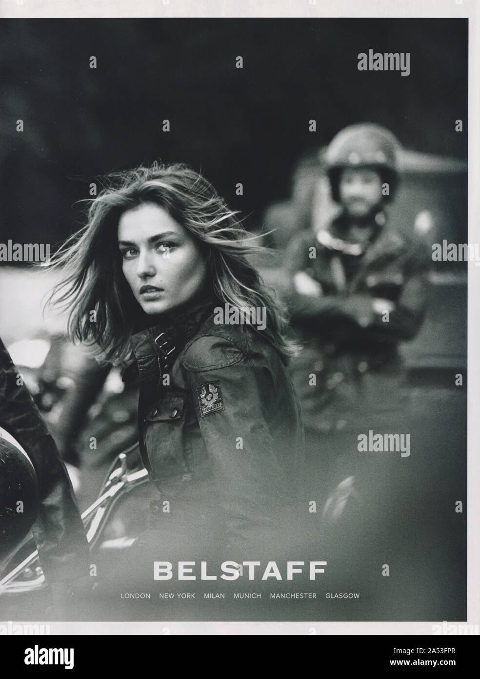 poster advertising Belstaff clothing brand with Andreea Diaconu in paper  magazine from 2014 year, advertisement, creative Belstaff advert from 2010s  Stock Photo - Alamy