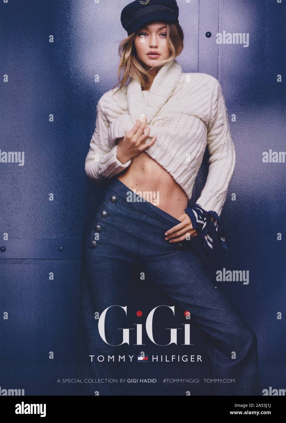 poster advertising Tommy Hilfiger fashion house with Gigi Hadid in paper  magazine from 2016 year, advertisement, creative Tommy Hilfiger 2010s advert  Stock Photo - Alamy