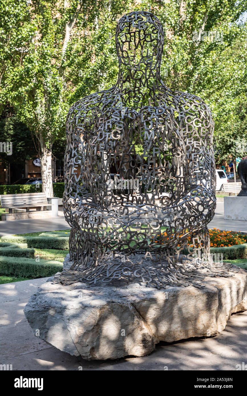 Armenia. Yerevan. August 16. 2018.  'Shadows 1,' 2006, by Jaume Plensa. Sculpture Garden at the Cafesjian Center for the Arts. Stock Photo