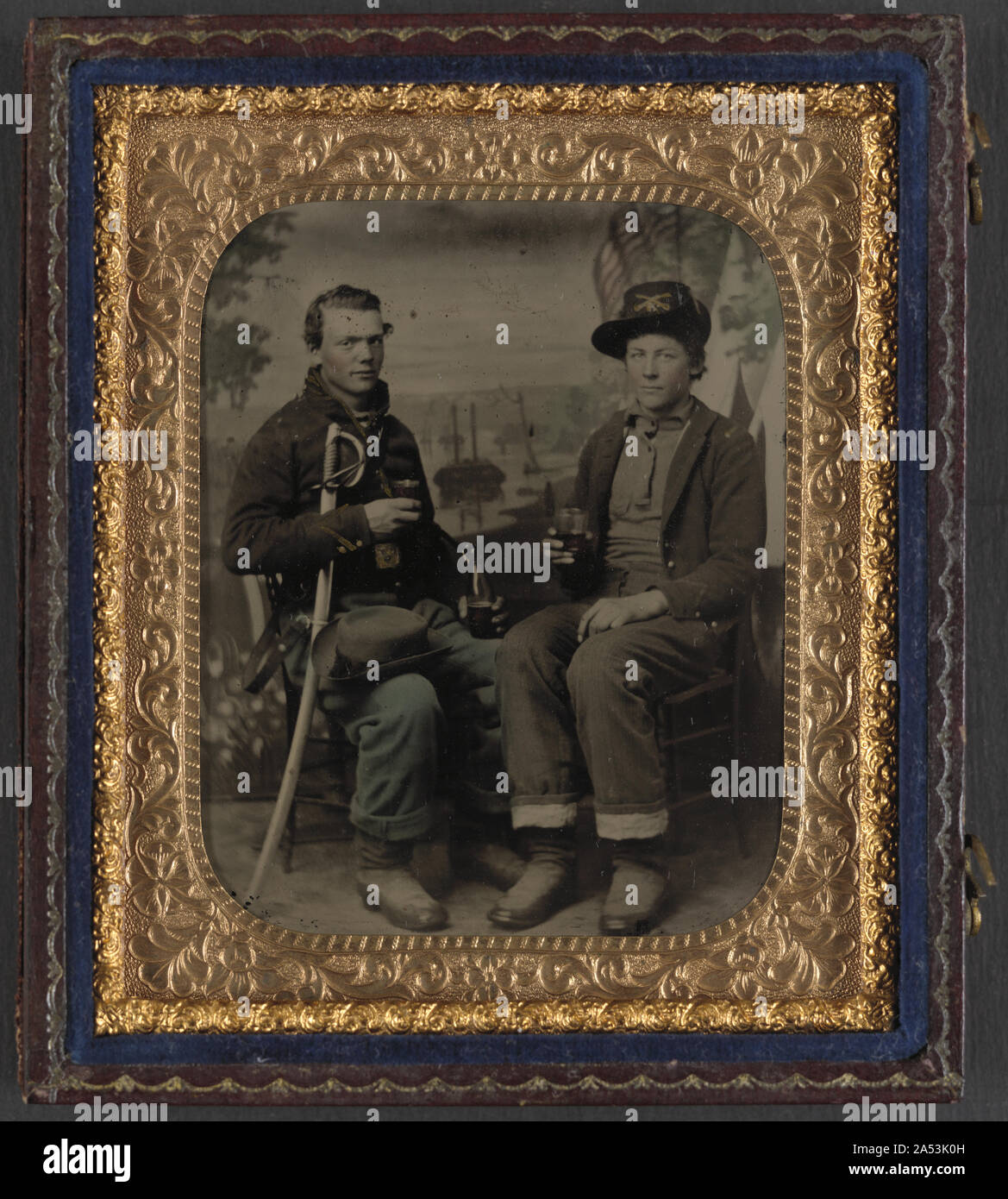 Two unidentified soldiers in Union cavalry uniforms with sword share a ...
