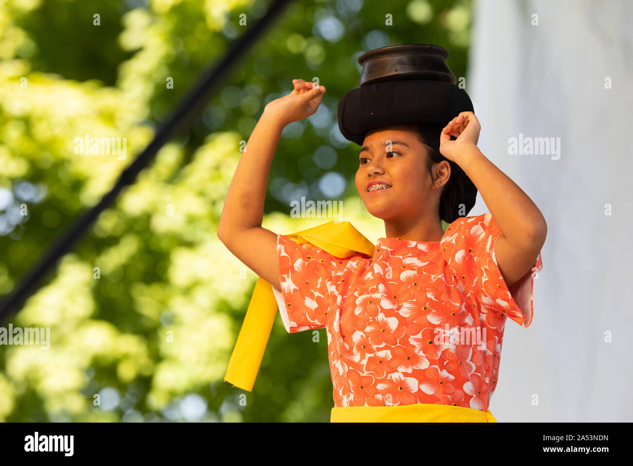 St. Louis, Missouri, USA - August 24, 2019: Festival of Nations, Tower Grove Park, Members of the Philippine Art Foundation, wearing traditional cloth Stock Photo