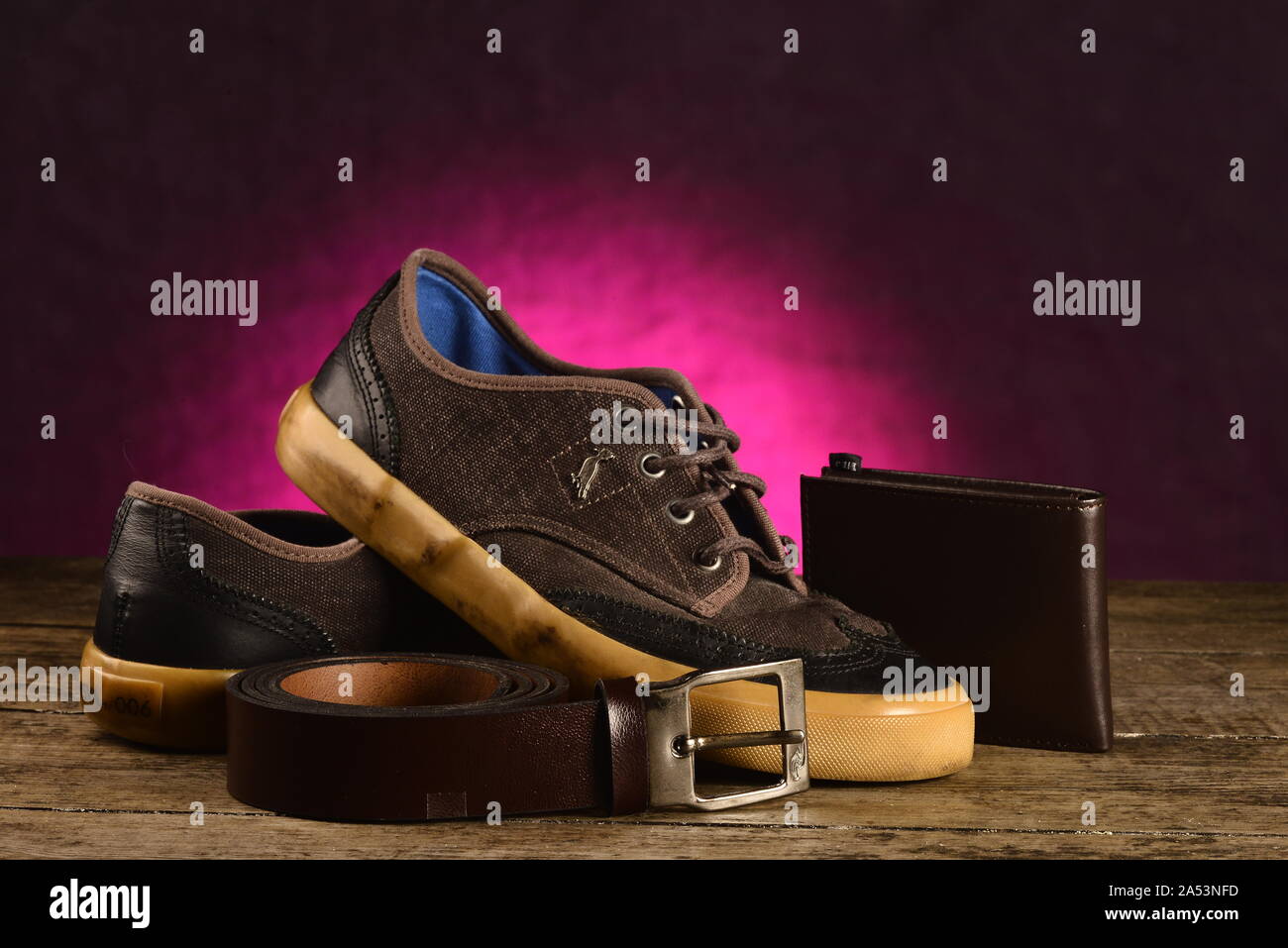 Sport shoes, wallet and belt Stock Photo Alamy
