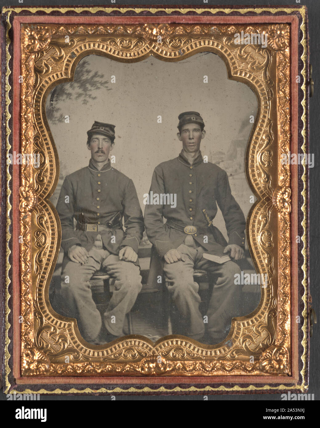 Two unidentified soldiers in Union uniforms with sword and book in ...