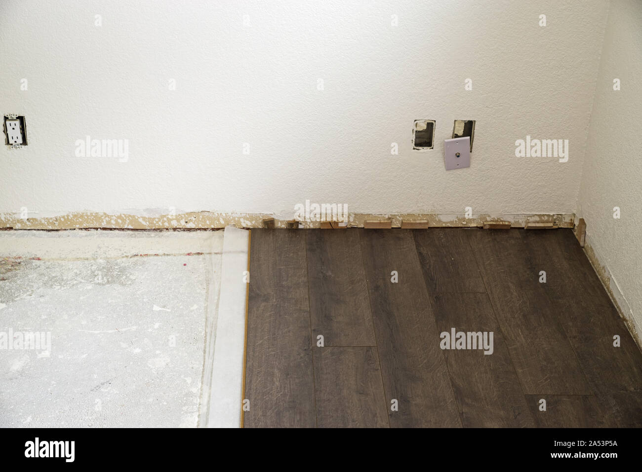 do it yourself laminate floor instalation over a concrete floor Stock Photo