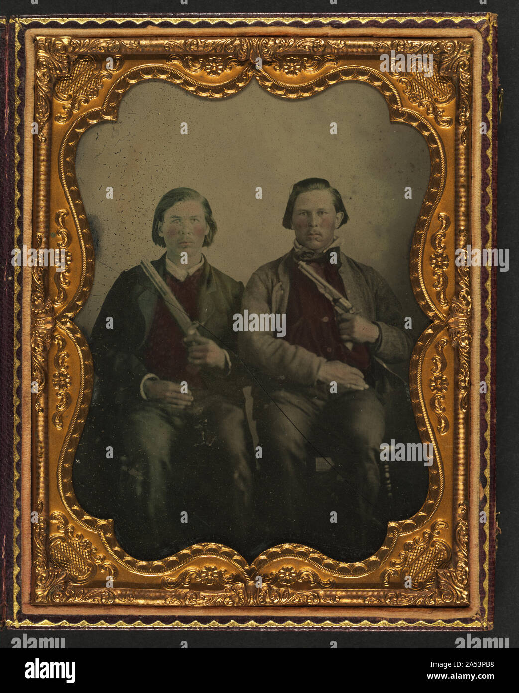 Two unidentified soldiers in non-regulation Confederate uniforms with ...