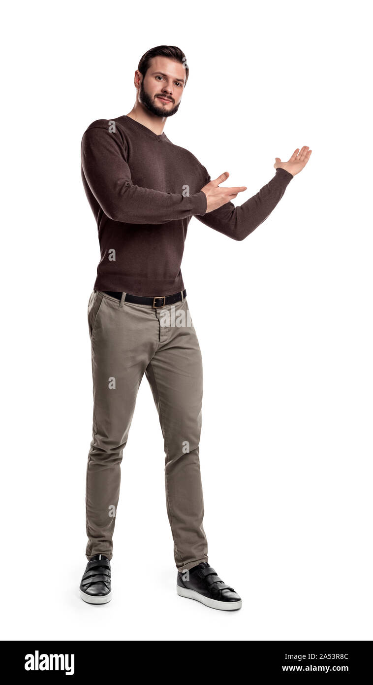 A bearded man in casual clothes makes a short step and presents ...