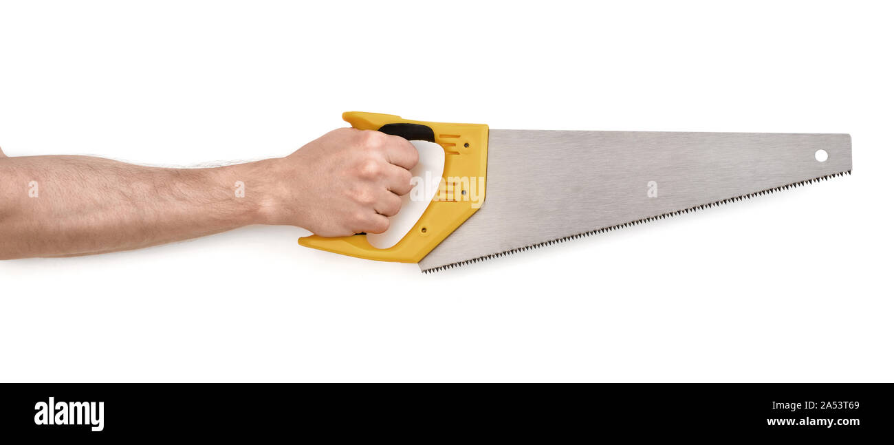 Close-up view of man's hand with handsaw, isolated on white background Stock Photo