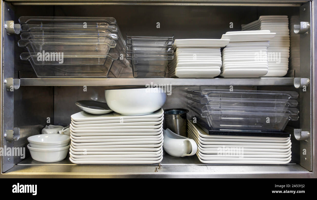Old stainless steel industrial kitchen with stacks of square