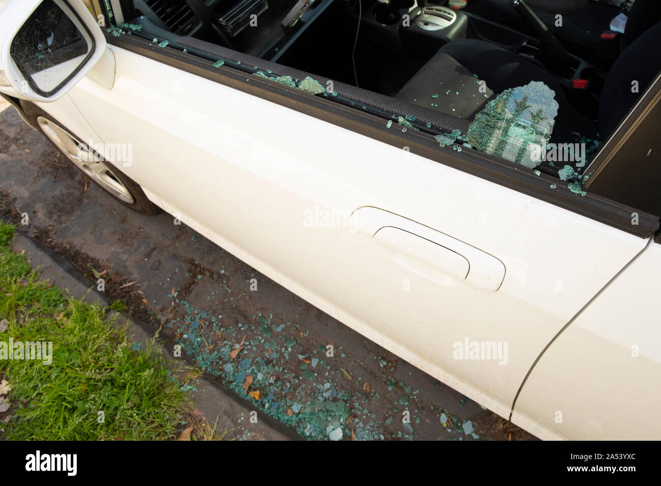 Car with broken driver side window Stock Photo Alamy