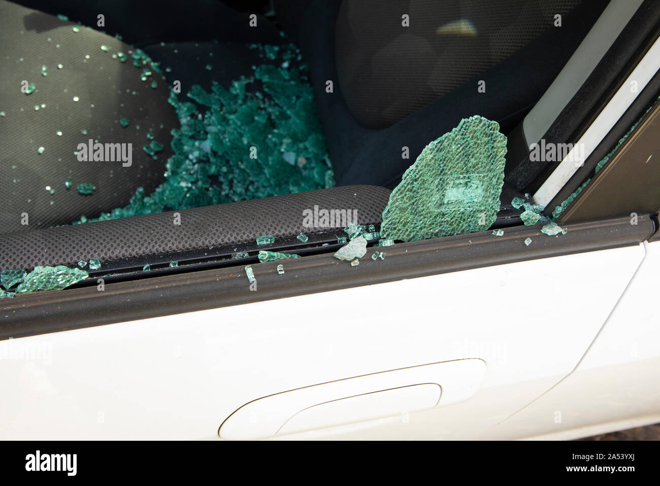 Car with broken driver side window Stock Photo Alamy