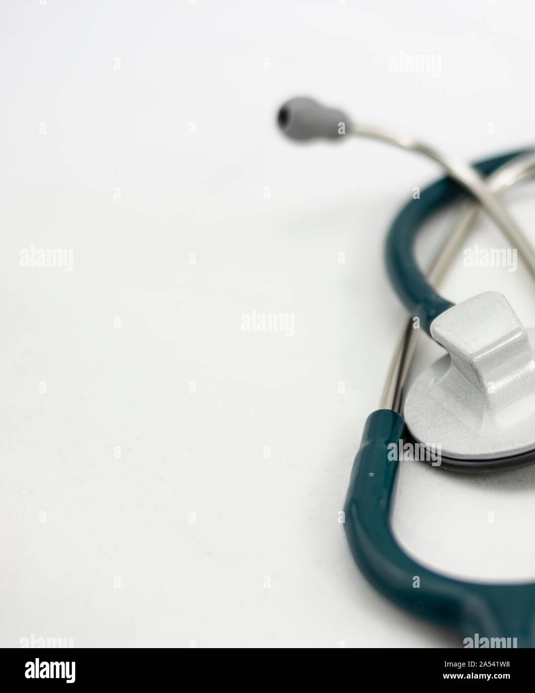 Green stethoscope on white background Stock Photo - Alamy
