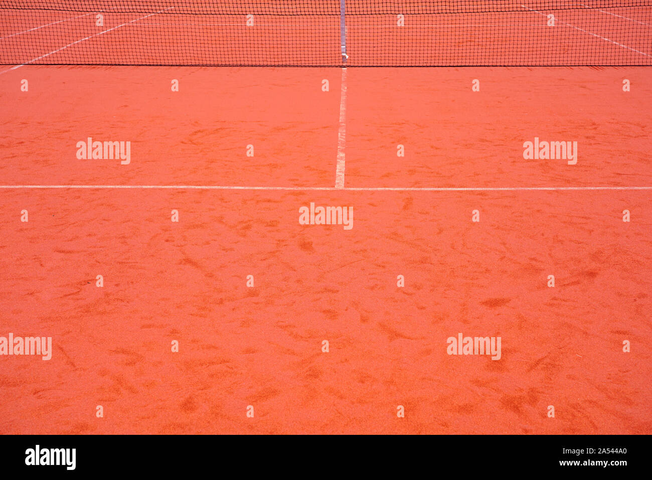 View of a red clay surface tennis court Stock Photo Alamy