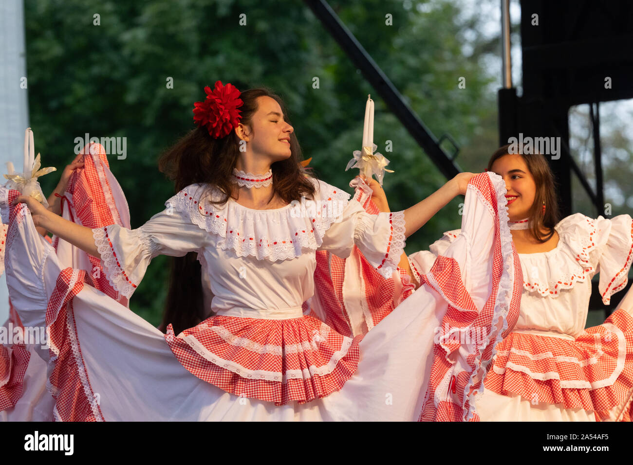St. Louis, Missouri, USA - August 25, 2019: Festival of Nations, Tower Grove Park, members of the Grupo Atlantico, wearing traditional clothing, perfo Stock Photo