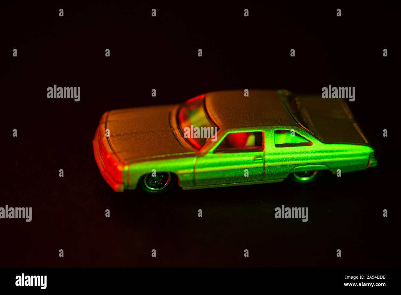 A toy car under red and green light. Stock Photo