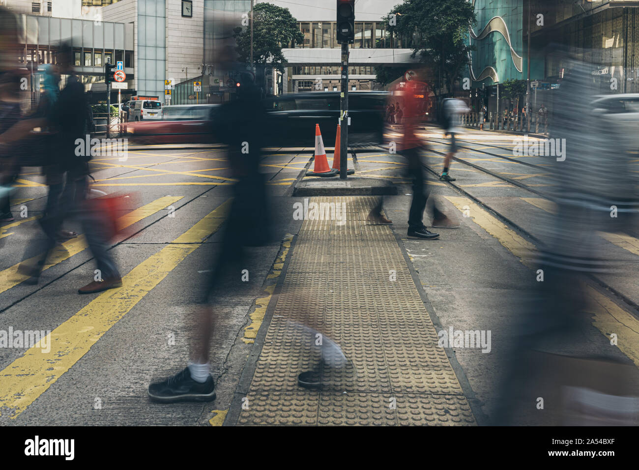People crossing on the busy street of Central District in Hong Kong