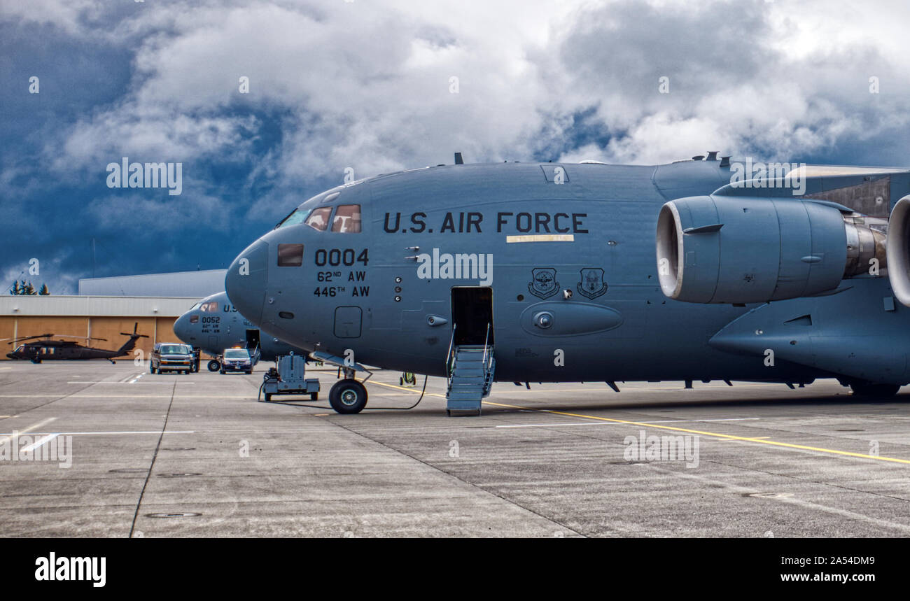 Two C17 Globemaster IIIs based out of McChord Field Washington prepare