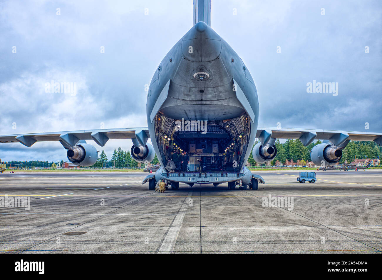 A C17 Globemaster III based out of McChord AFB has main cargo door open at Gray AAF on Ft