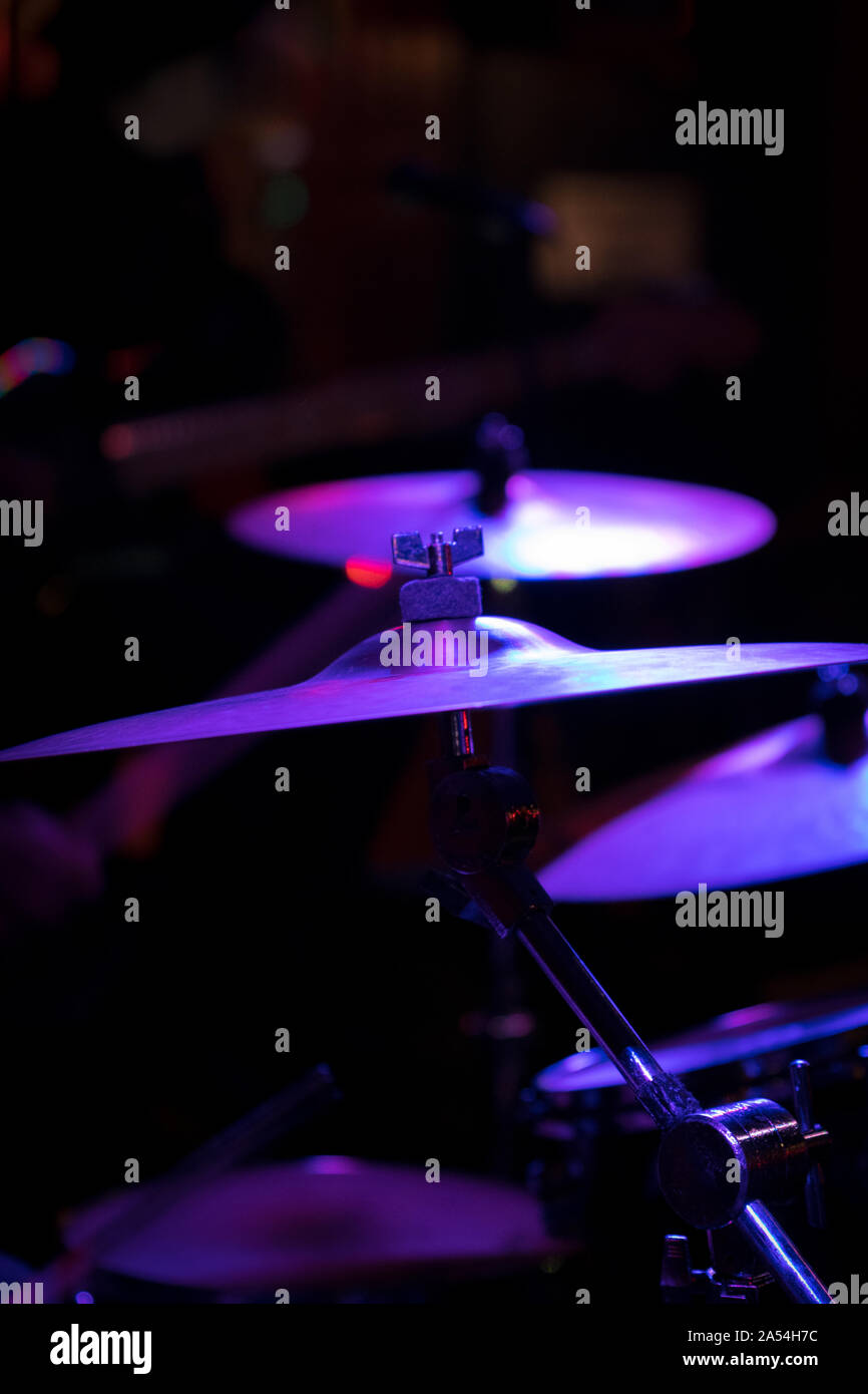 Closeup of cymbals on a stage, in a New York City nightclub Stock Photo