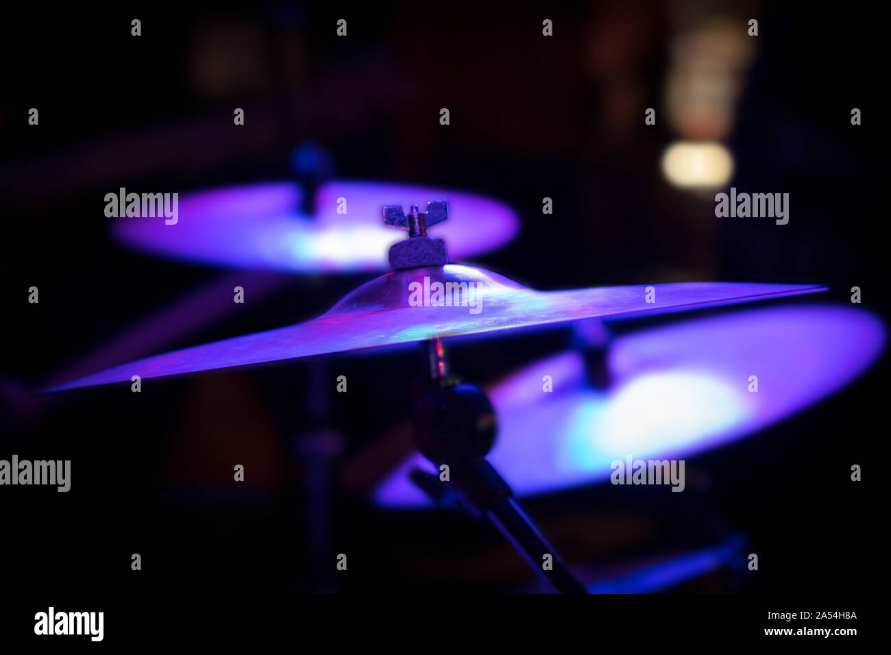 Closeup of cymbals on a stage, in a New York City nightclub Stock Photo
