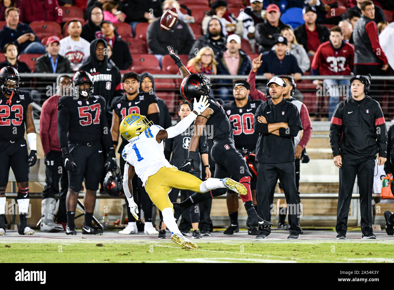 Stanford, California, USA. 17th Oct, 2019. That ball is just a little too high for Stanford Cardinal wide receiver Connor Wedington (5) being defended by UCLA Bruins defensive back Darnay Holmes (1) during the NCAA football game between the UCLA Bruins and the Stanford Cardinal at Stanford Stadium in Stanford, California. Chris Brown/CSM/Alamy Live News Stock Photo