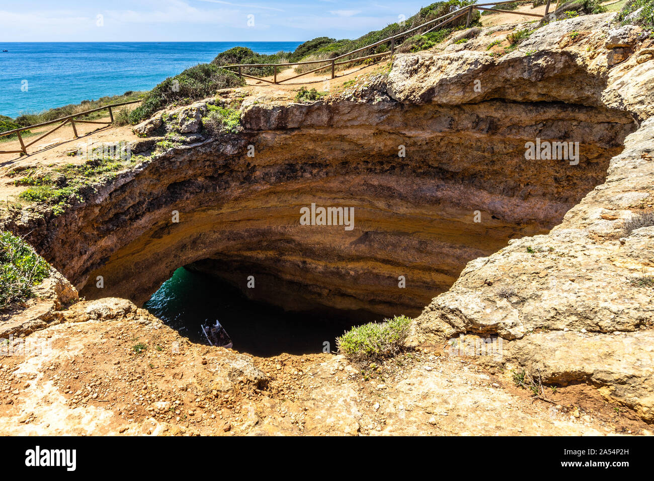 The big hole on the cliffs above the Benagil cave (Algar de Banagil), Lagoa, Algarve, Portugal Stock Photo