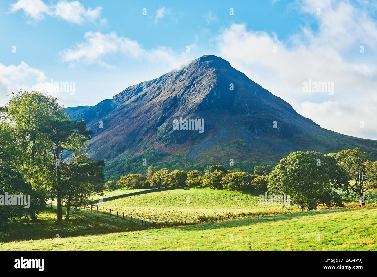 Carling Knott mountain peak as the sun rises on Loweswater, Lake district, Cumbria, England. Stock Photo