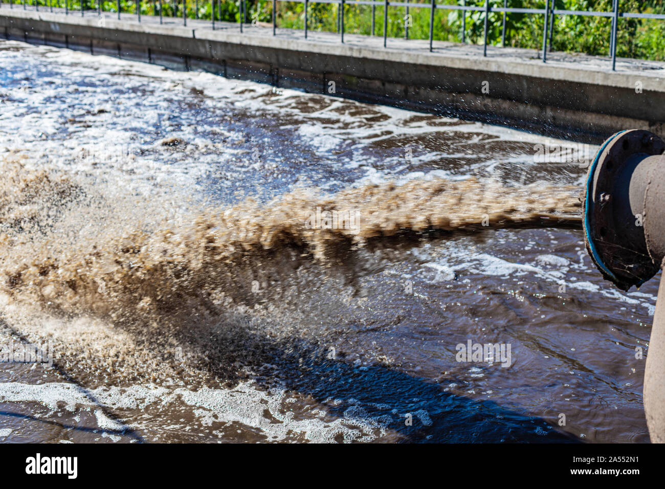 Treatment plant. City sewer. Dirty water flows from the pipes. Environmental pollution. Cleaning