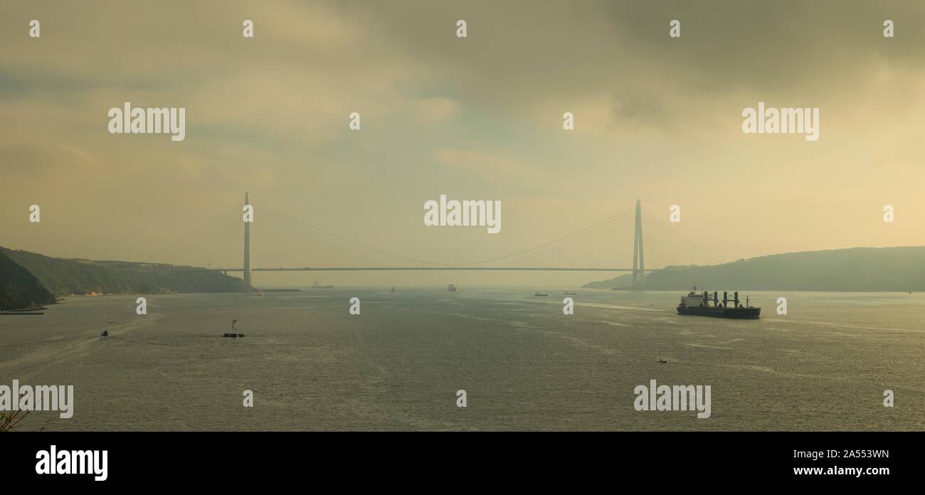 Yavuz Sultan Selim Bridge and Bosphorus in the morning. Bosphorus ship traffic and dramatic sky. Turkey Stock Photo