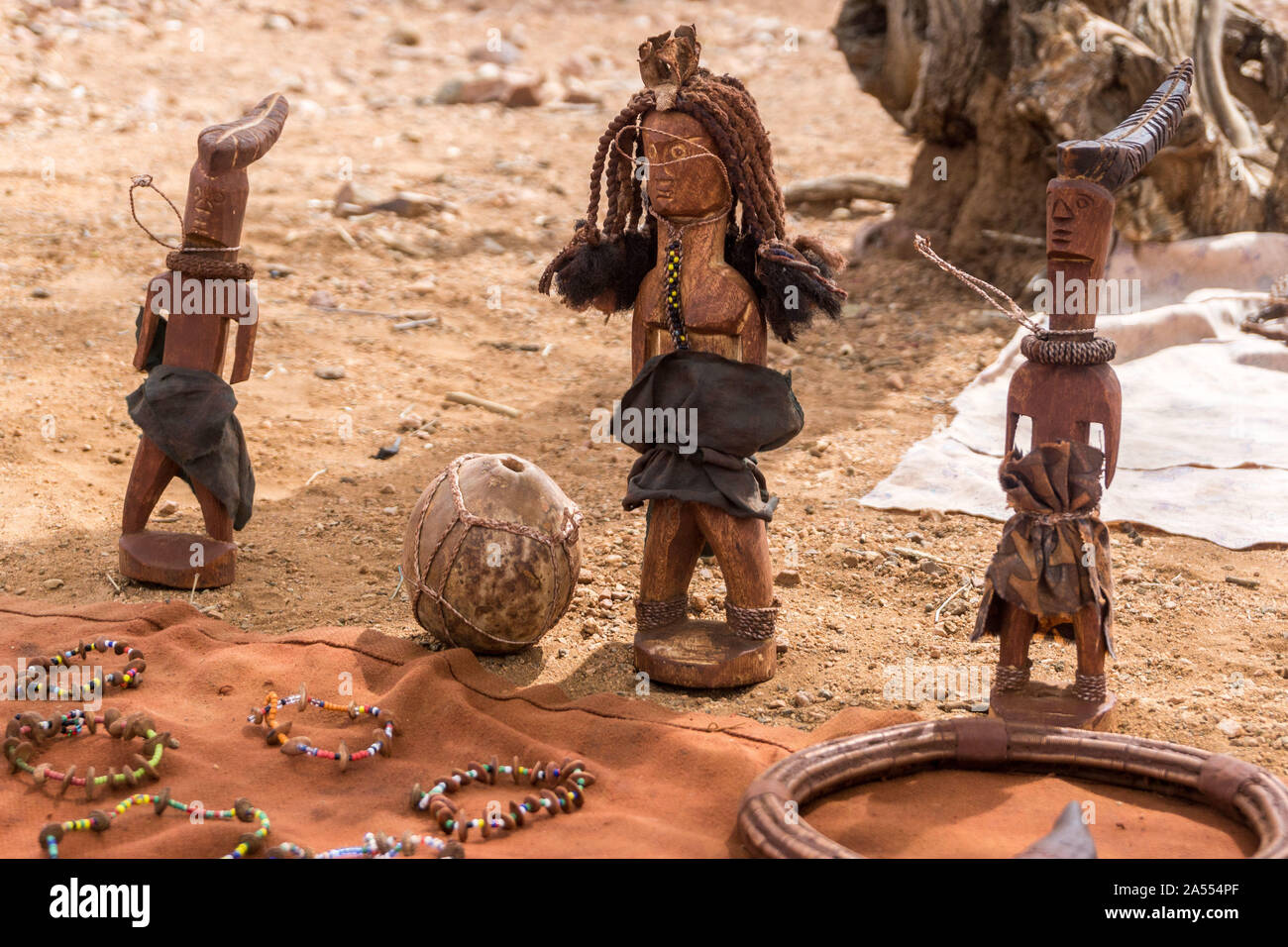 Traditional wooden puppets made by Himba people for selling to tourists, Kaokoland, Namibia, Africa Stock Photo