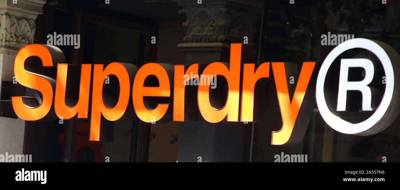 Superdry logo seen in Passeig de Gràcia, Barcelona Stock Photo - Alamy