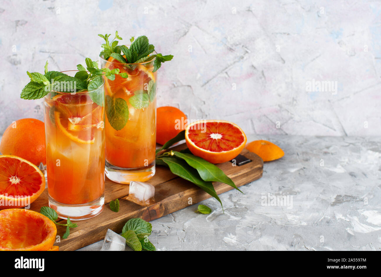 Homemade refreshing drink with bloody orange juice and mint close up Stock Photo