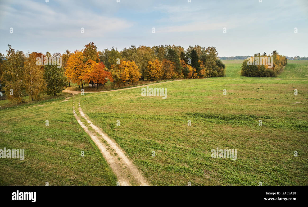 Beautiful autumn landscape. Country side road drone top view Stock Photo