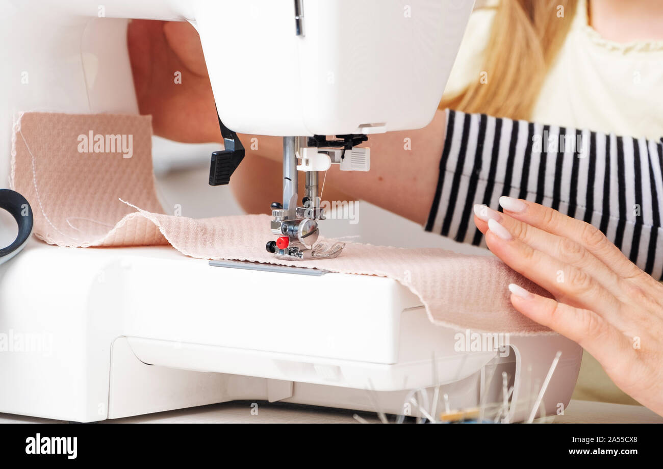 Process of sewing on machine Stock Photo Alamy