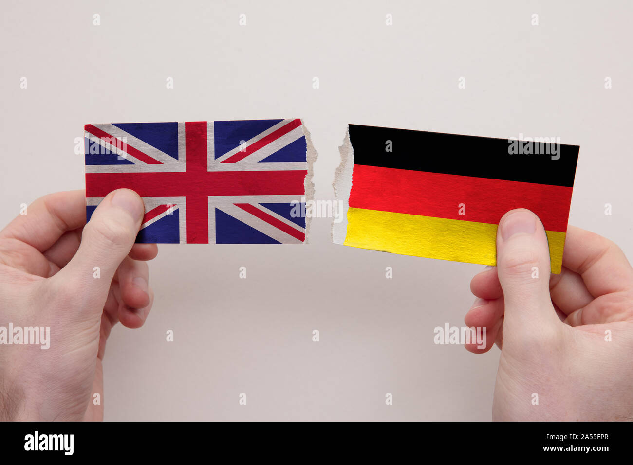 UK and Germany paper flags ripped apart. political relationship concept Stock Photo