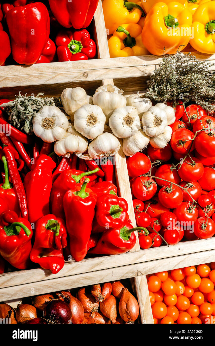 Cologne, North Rhine-Westphalia, Germany - EU organic vegetables, organic tomatoes and organic peppers in a vegetable counter on the Organic Market at Stock Photo