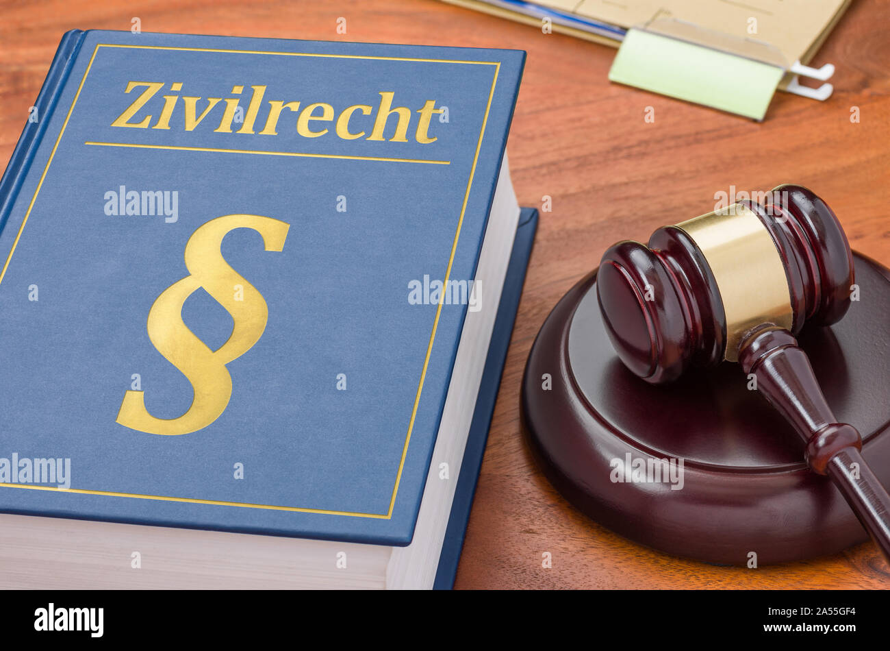 A law book with a gavel German Translation of Civil Code Zivilrecht
