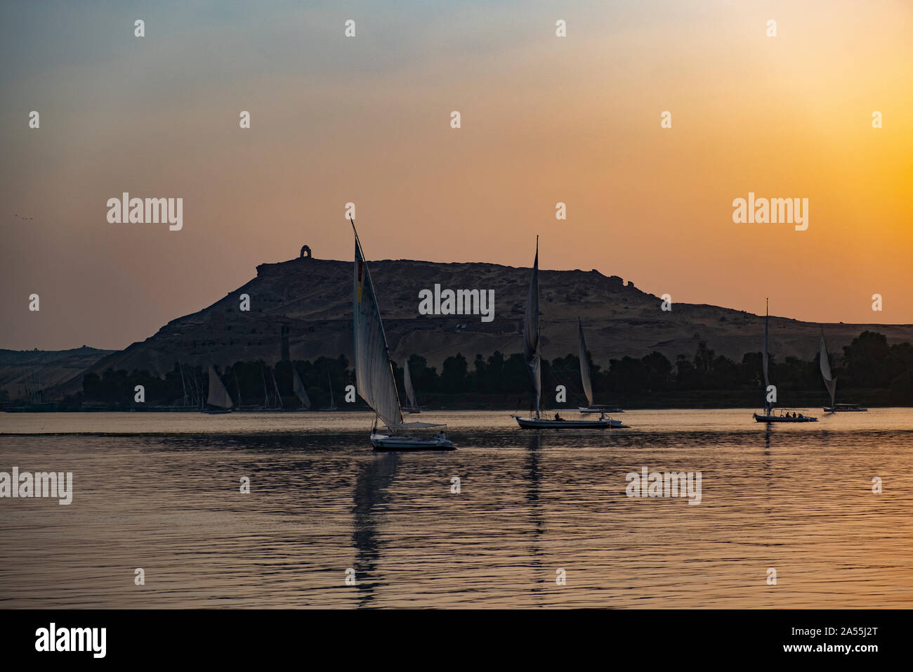 Felukka sailing boats on the Nile river near Assuan, Egypt. Stock Photo