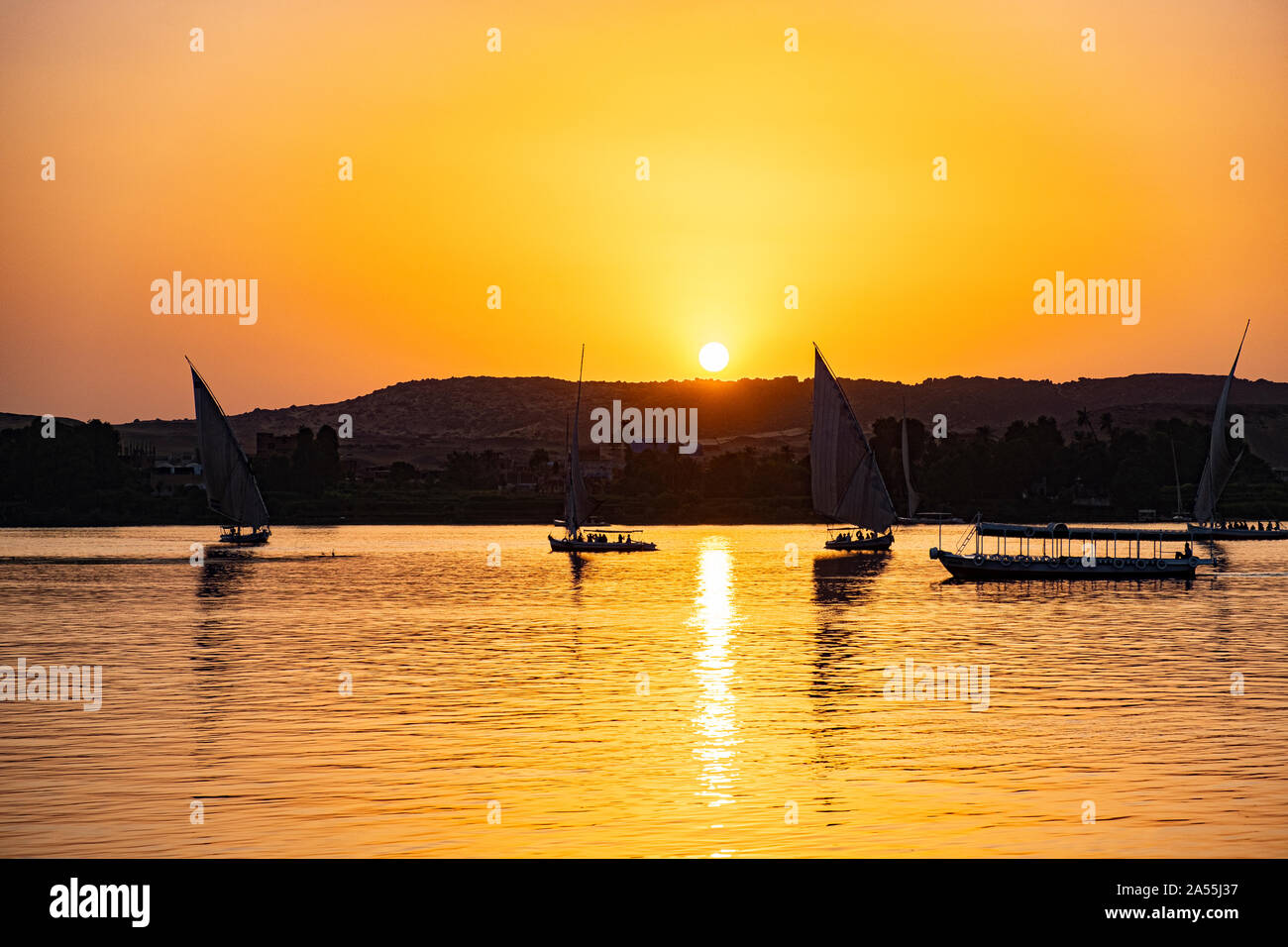 Felukka sailing boats on the Nile river near Assuan, Egypt. Stock Photo