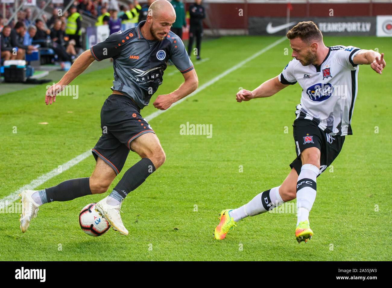 RIGA, LATVIA. 17th of July, 2019. Roman Debelko (L) and Andy Boyle (R), during UEFA Champions League 1st round 2nd leg football game between RIGA FC and DUNDALK FC. Skonto stadium, Riga Stock Photo